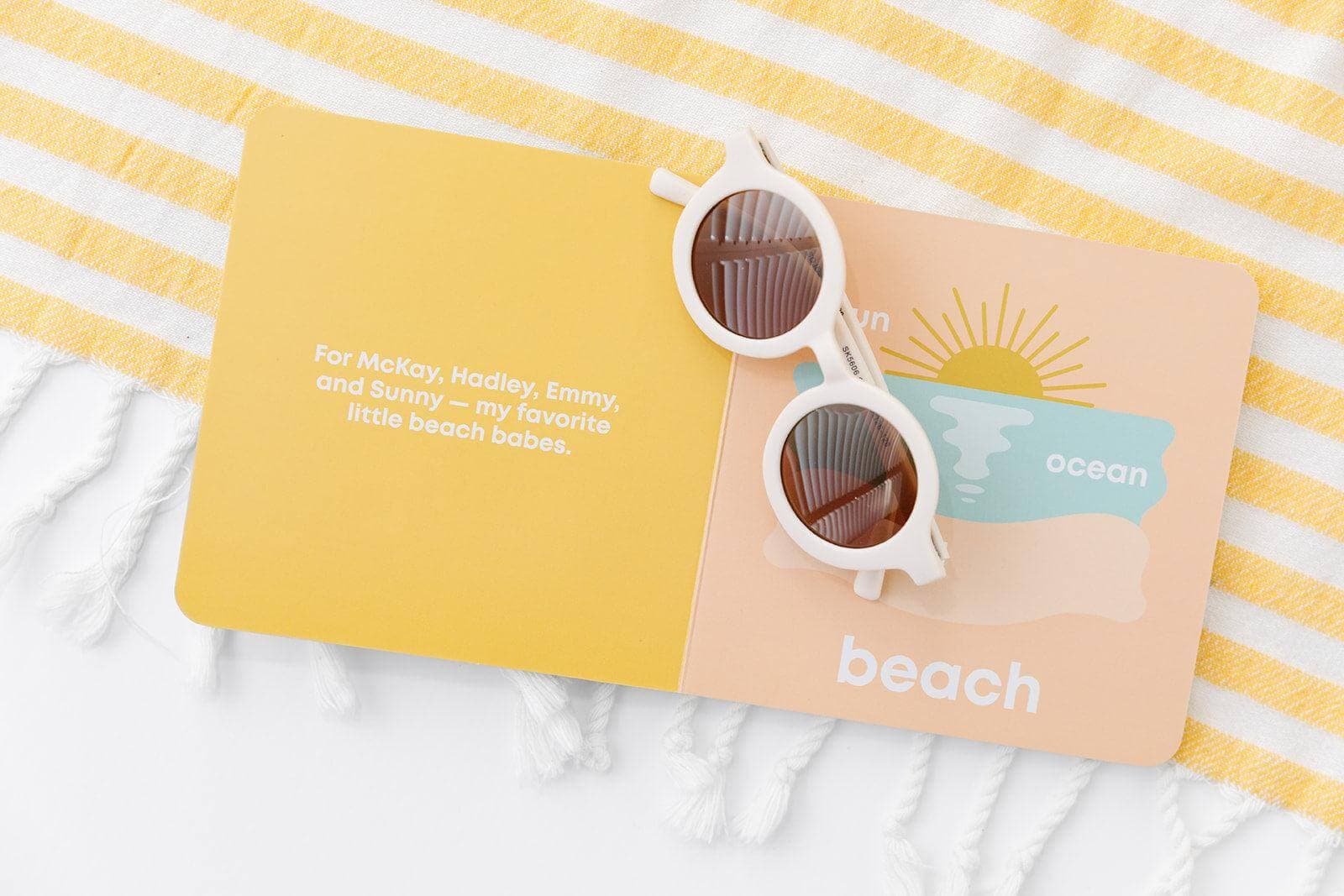 beach baby book, baby beach book, toddler beach book, sports book for toddlers, sports book for babies, baby board book soccer, modern baby books, cute board books, baby shower gift, nursery decor, baby surf book